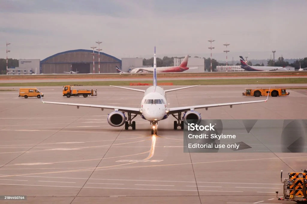 Charter aircraft undergoing pre‑flight ground handling.