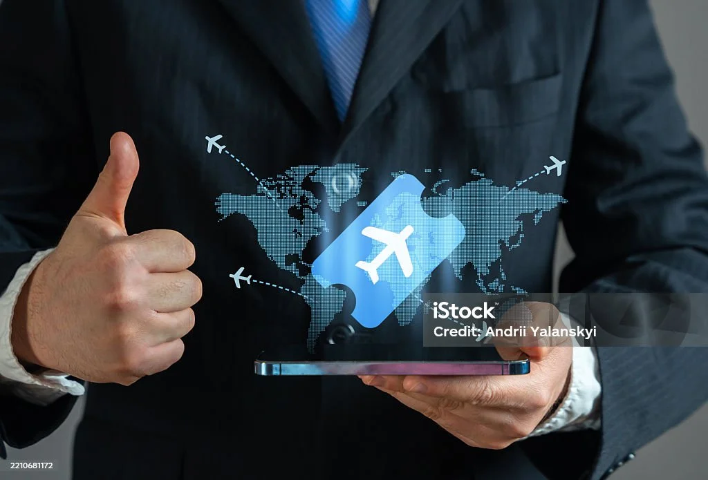 Business professional displaying aircraft management interface.